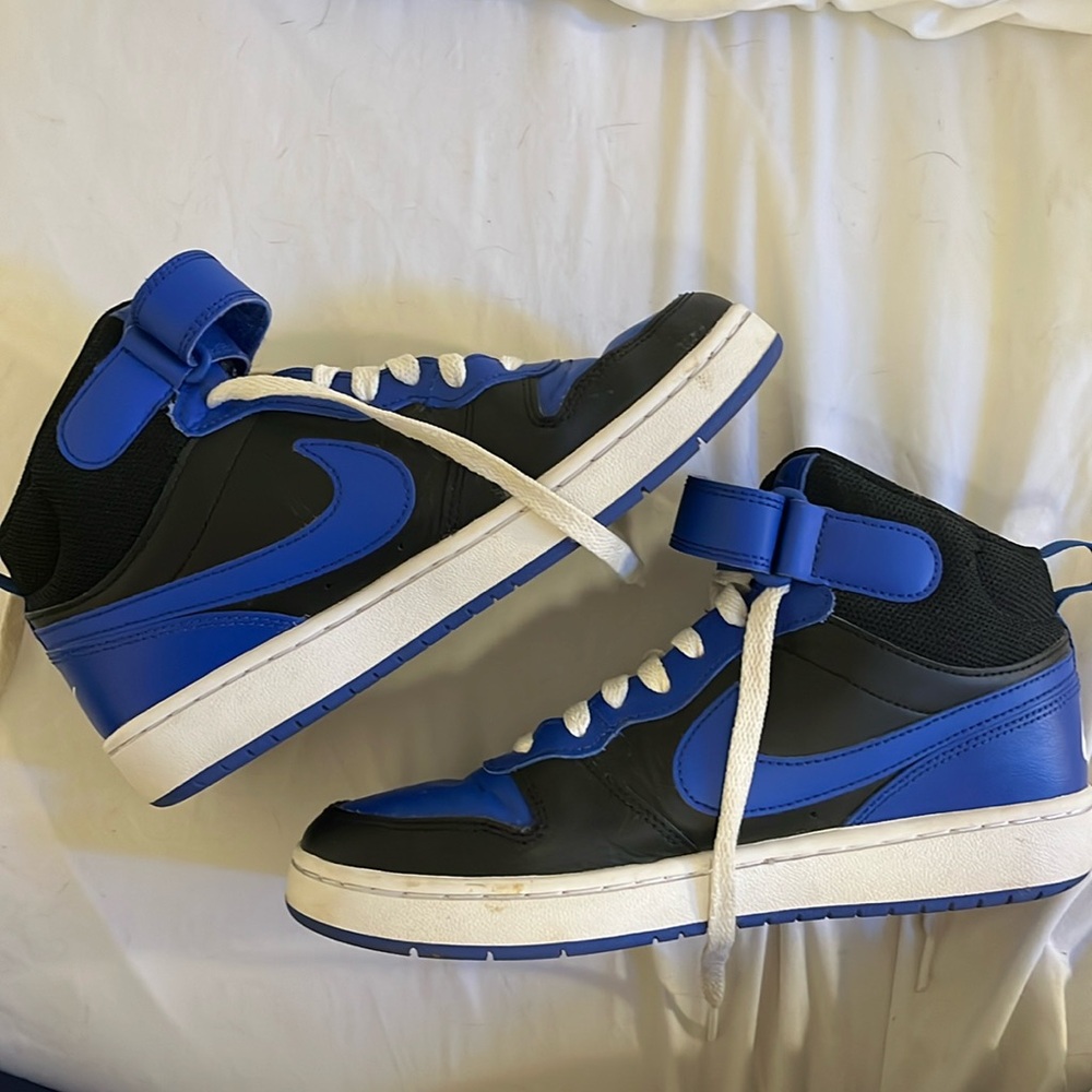 Black and blue Nike shoes, size 5.5Y